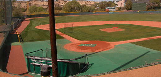 baseball infield behind fencing