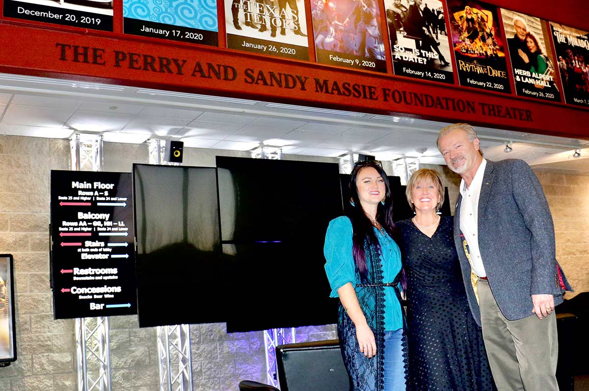 Local philanthropists Perry and Sandy Massie with their daughter, Georgia