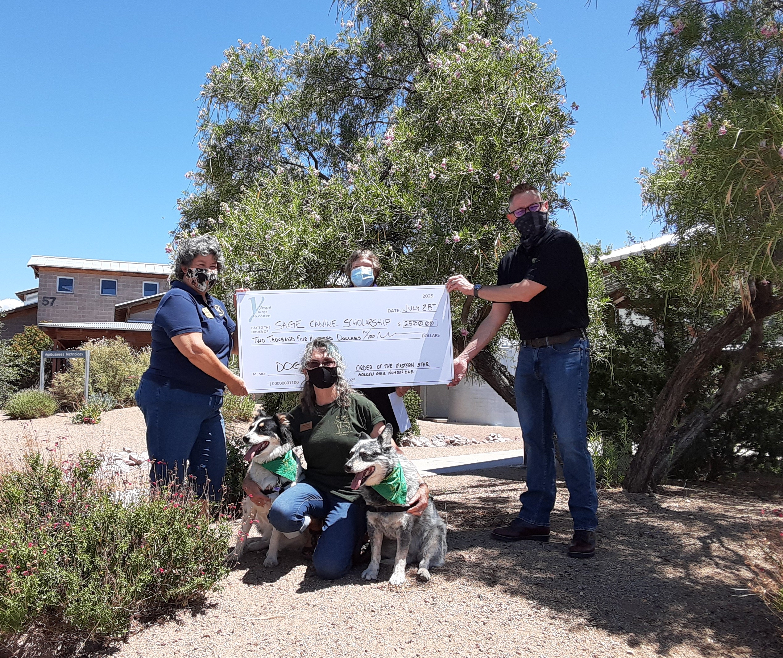 Representatives of AZ Eastern Star present a scholarship check to the YC Canine Program