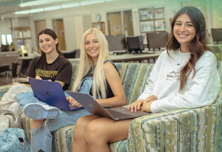 Group of students walking on campus