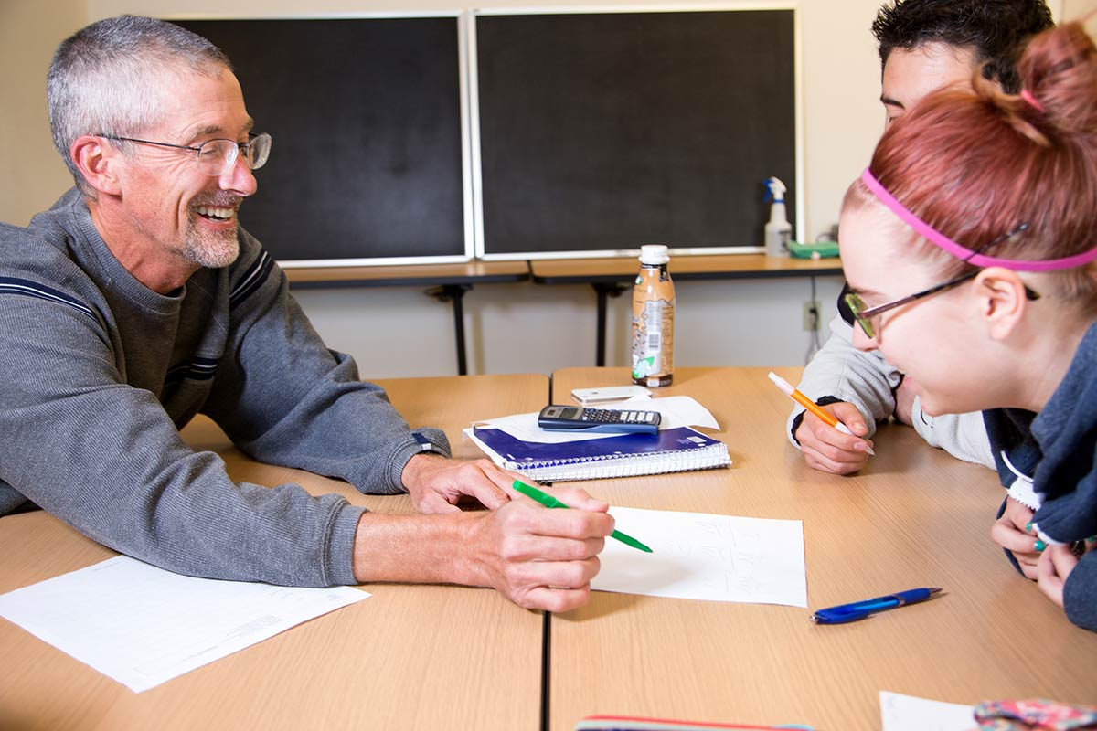 YC instructor Jim Bostwick working with students